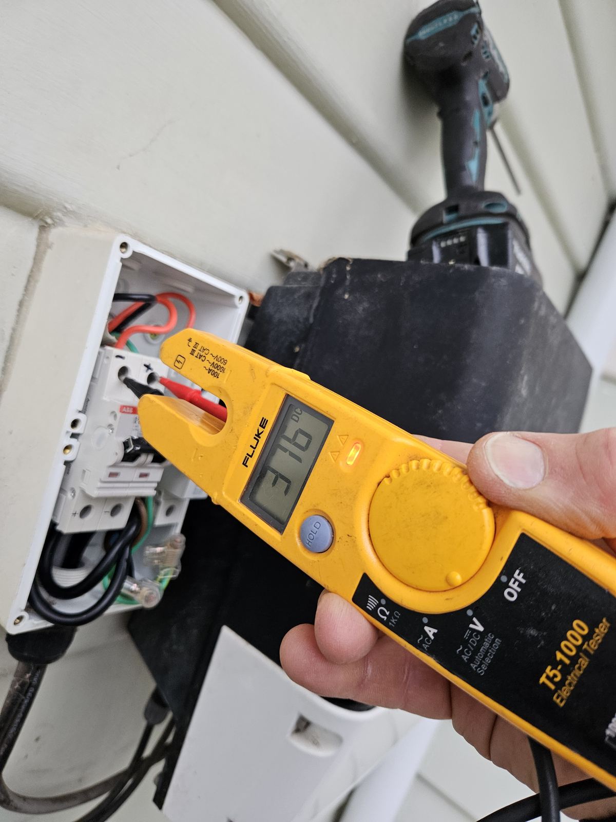 Electrical testing with a clamp meter, Melbourne Metro